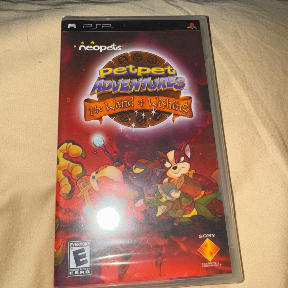 Sony PSP Game with Red and Orange Cover Art